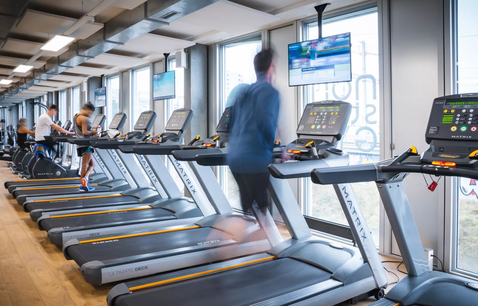 Écrans d'affichage dynamique installés par Pixium chez Non-Stop Gym